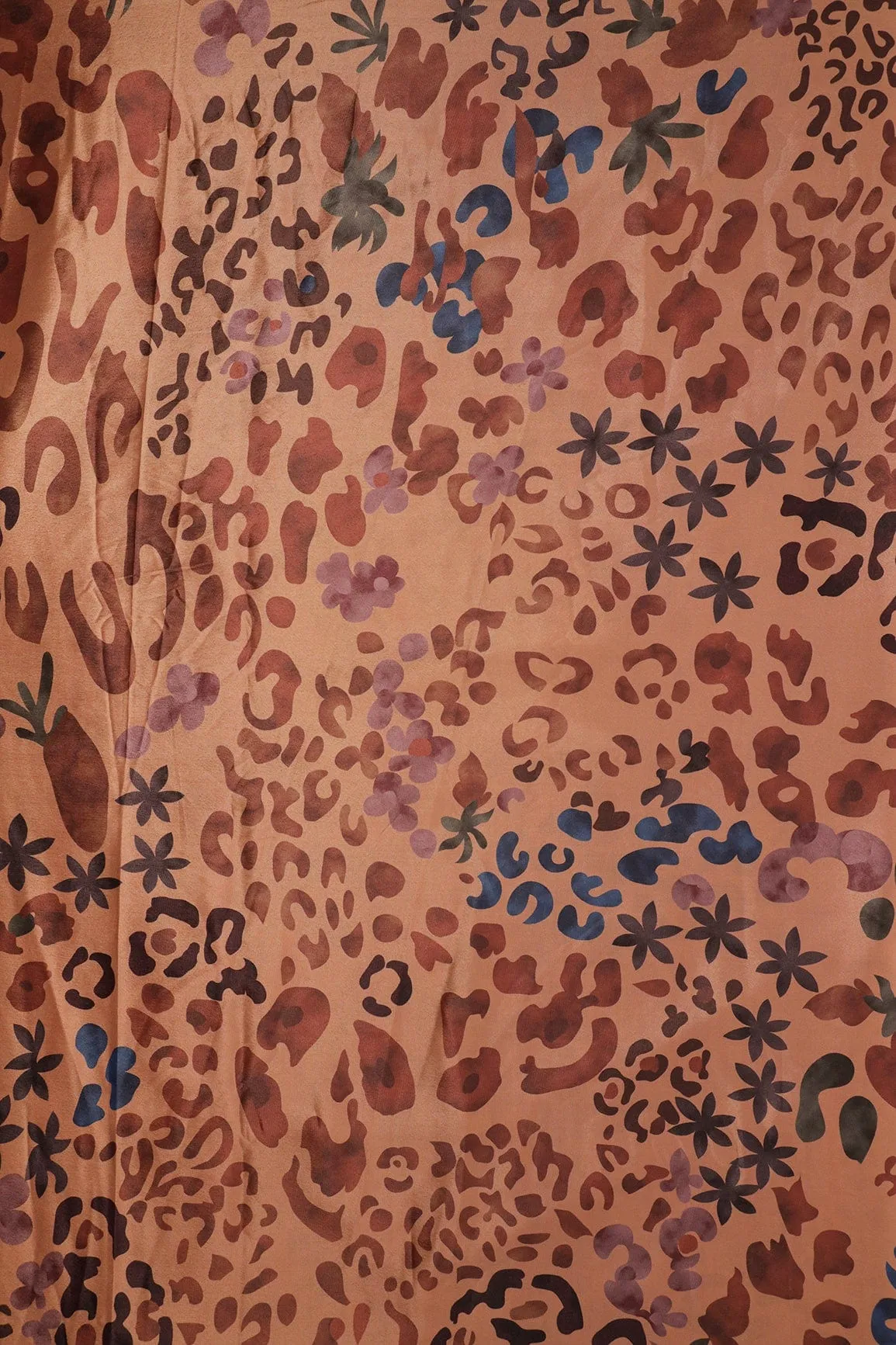 Brown And Blue Abstract Print On Pastel Orange Crepe Fabric